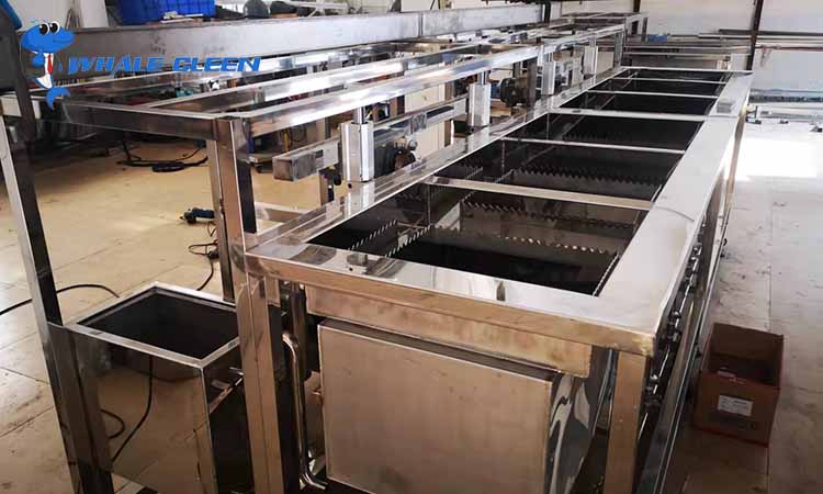 Ultrasonic cleaning machine for parts